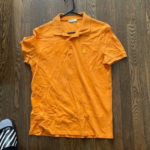 Used authentic Versace polo w/few mark but gr8 buy